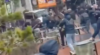 Heftige beelden uit Eindhoven: supporters van PSV en Zürich clashen in het centrum